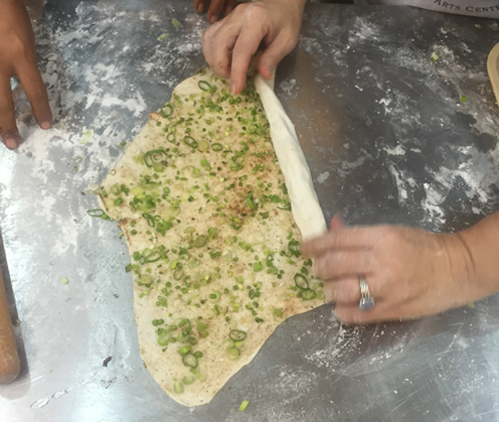 rolling scallion pancakes